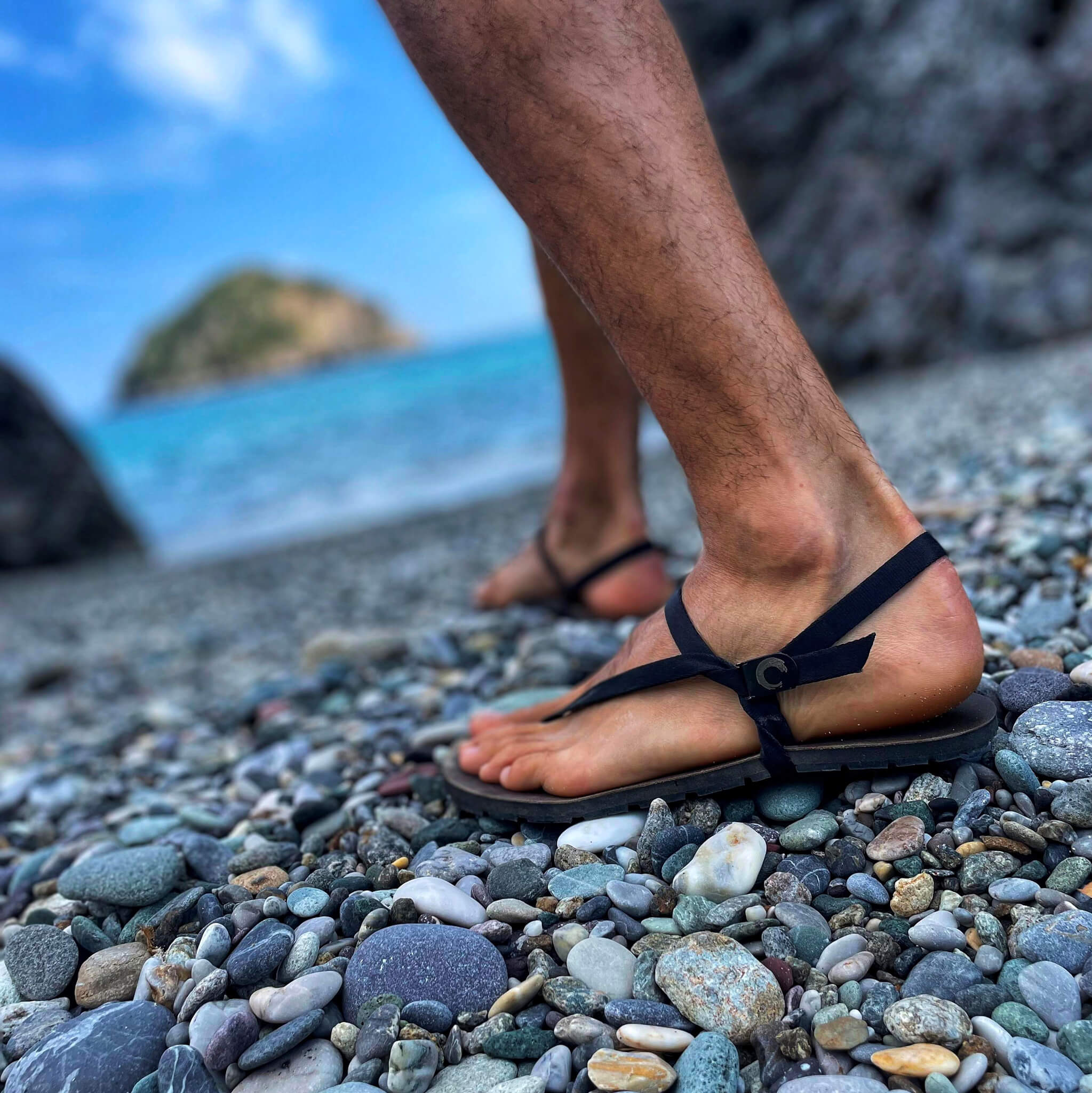 Eco-friendly_ZuZu_Groove_barefoot_sandals_with_a_durable_antibacterial_vegan_leather_footbed_and_sustainable_replaceable_recycled_black_straps.