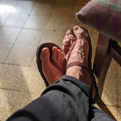 Man_chilling_with_ZuZu_Groove_Barefoot_Sandals_Burgundy_Straps