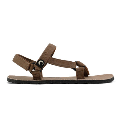 ZuZu Drift lightweight eco-friendly sandals with recycled and natural sole, durable canvas footbed, and recycled straps. designed for all-day comfort and minimalist. Earthy brown. Side view